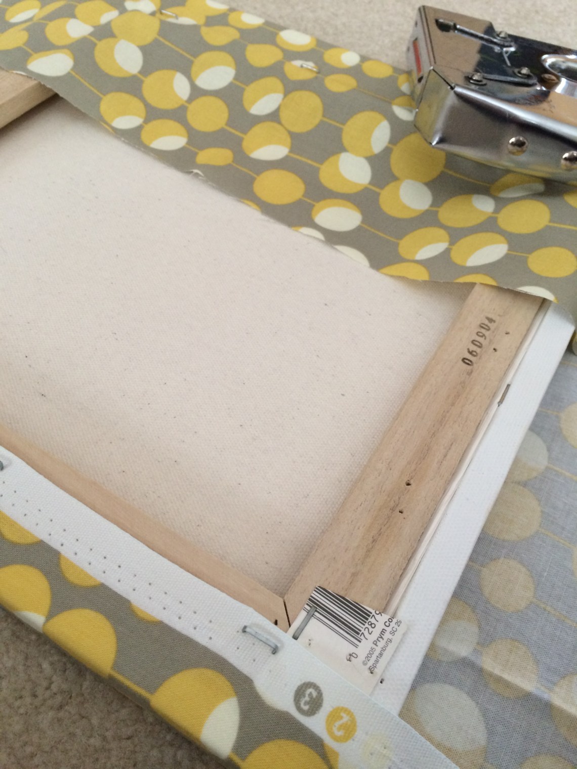 staple fabric canvas frame yellow grey